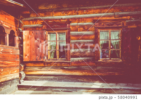 Traditional Siberian wooden house in the Taltsy Architectural-Ethnographic Museum. 58040991