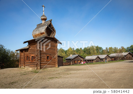 Traditional Siberian wooden house in the Taltsy Architectural-Ethnographic Museum. 58041442