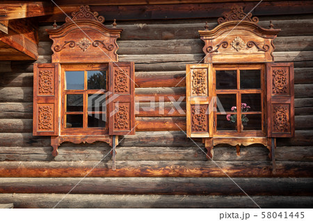 Traditional Siberian wooden house in the Taltsy Architectural-Ethnographic Museum. 58041445