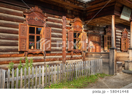 Traditional Siberian wooden house in the Taltsy Architectural-Ethnographic Museum. 58041448