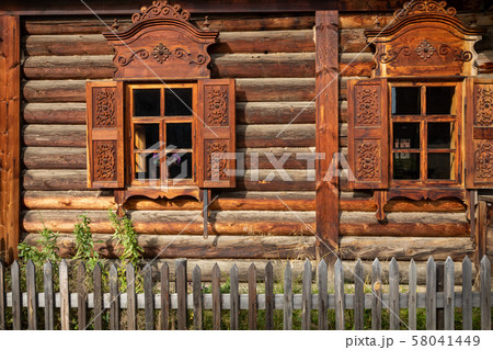 Traditional Siberian wooden house in the Taltsy Architectural-Ethnographic Museum. 58041449