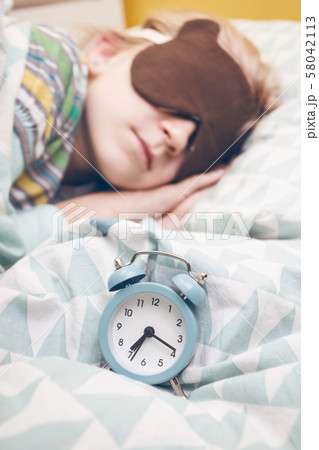 little girl sleeping in sleep mask little girl sleeping in sleep mask 58042113