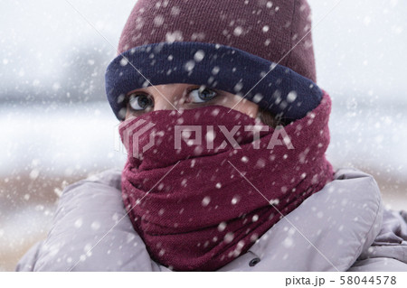 sad woman freezes 58044578