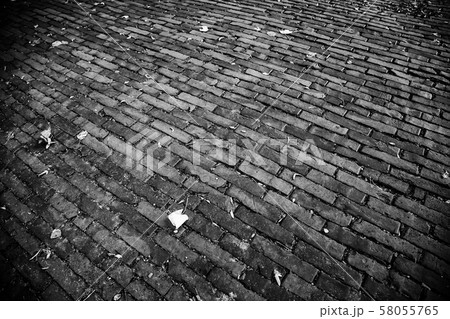 Wet cobbled floor 58055765