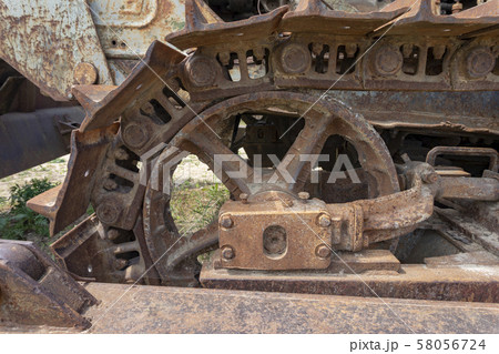 Close up of rusty steel tracks on old machinery 58056724