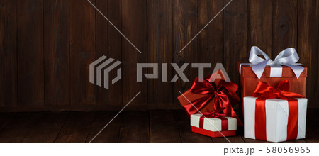 Holiday gifts on wooden background 58056965