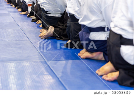 People in kimono and hakama on martial arts training People in kimono and hakama on martial arts training 58058339