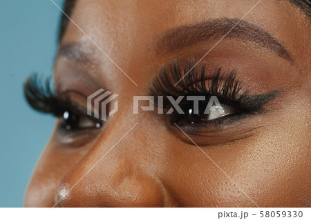 African-american young woman's close up portrait 58059330