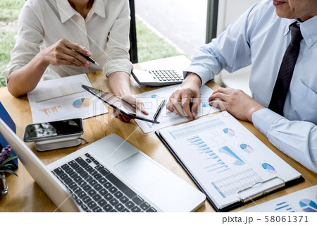 Two business team manager having a discussing with 58061371