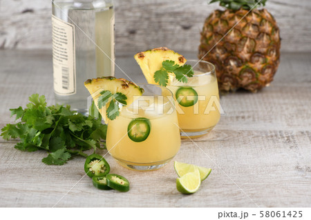 Tequila with pineapple and jalapeno 58061425