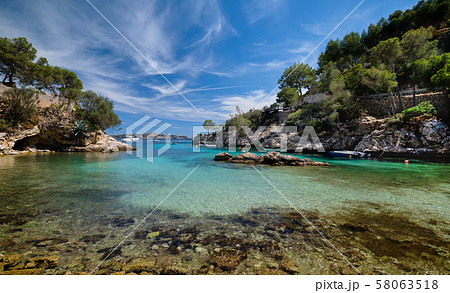 Picturesque beach Calo de ses Llises Picturesque beach Calo de ses Llises 58063518