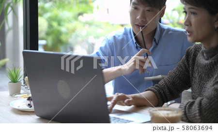 Holiday concept. Business people work earnestly in Holiday concept. Business people work earnestly in 58063694