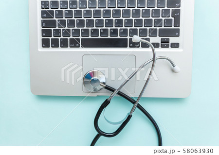 Stethoscope keyboard laptop computer isolated on Stethoscope keyboard laptop computer isolated on 58063930