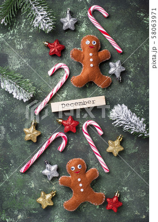 Christmas background with felt gingerbread men 58063971