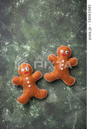 Christmas gingerbread men made of felt 58063985