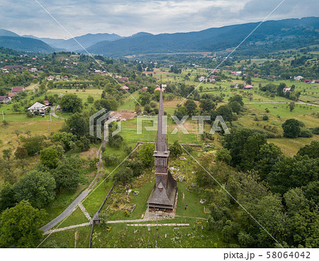 Aerial panoramic view of traditional ancient Maramures wooden orthodox church in Transylvania with 58064042