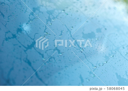 Rain drops on car window, abstract background 58068045