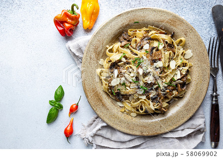 Tagliatelle pasta with mushrooms Tagliatelle pasta with mushrooms 58069902