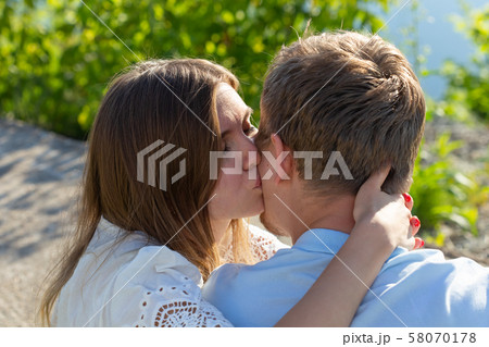 happy romantic couple in love and having fun outdoor in summer day, beauty of nature, harmony 58070178