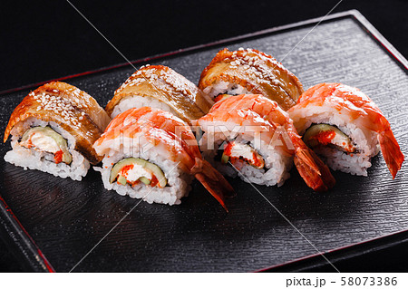 Japanese food, tasty of meal for lunch. Seafood. Sushi with Shrimp and eel black background. 58073386