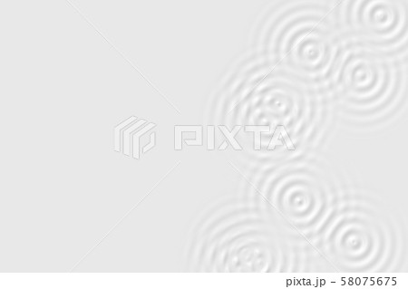 Abstract of many white oil ripples on gray 58075675