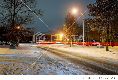 Car light in night on ice road in in the Car light in night on ice road in in the 58077103