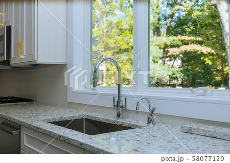 Interior of modern kitchen with appliances on 58077120