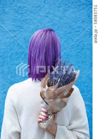 Young lady with lavender bouquet turn her back Young lady with lavender bouquet turn her back 58083751