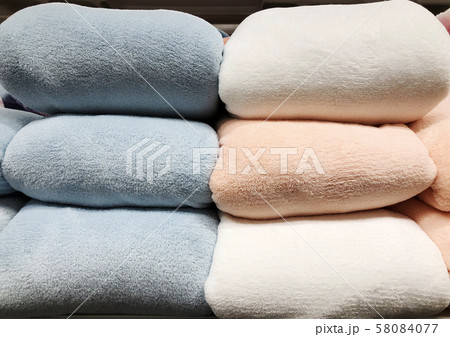 Sale of warm winter clothes in the store 58084077