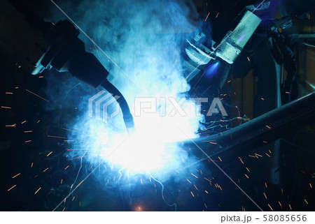 Robot arm in smart factory background 58085656
