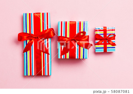 Gift box with red bow for Christmas or New Year 58087081