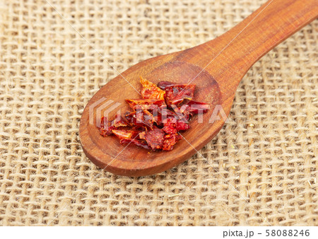 Dry red pepper in spoon Dry red pepper in spoon 58088246