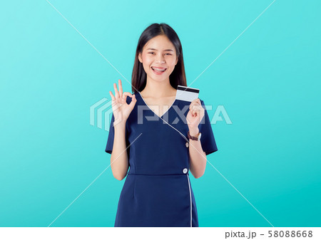 Beautiful Asian woman good skin, shows ok sign 58088668