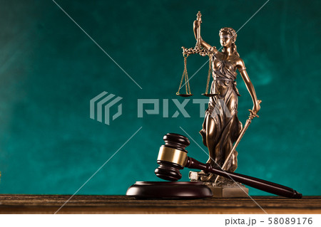 brown gavel with statue of justice. brown gavel with statue of justice. 58089176