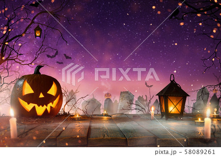 Halloween pumpkins on dark spooky forest. 58089261