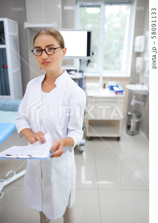 Young female doctor in ultrasound office stock photo 58091133