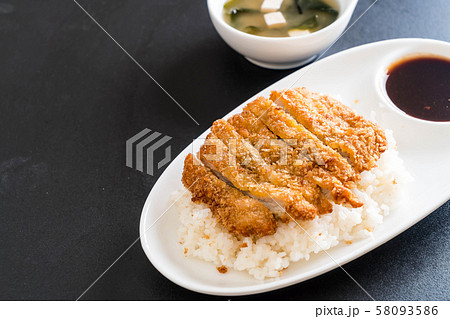 fried pork on topped rice (tonkatsu) with miso fried pork on topped rice (tonkatsu) with miso 58093586