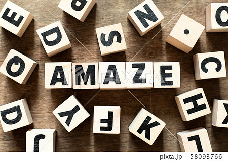 Wood letter block in word amaze on wood background 58093766