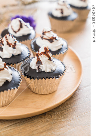 chocolate cup cake with whipped cream chocolate cup cake with whipped cream 58093767