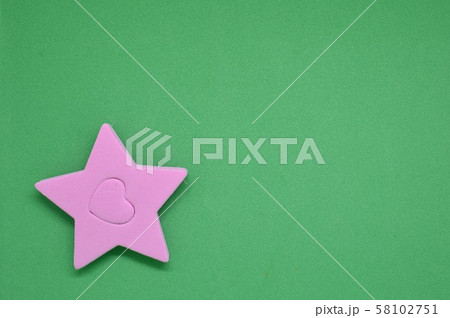 Textured green background for card or web application with eva rubber figures 58102751