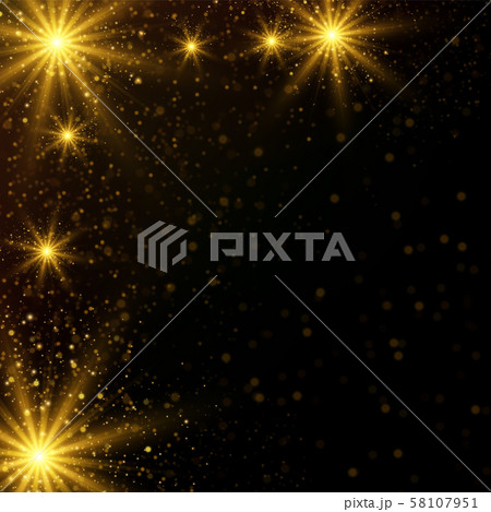 Sparkling golden magic lights on black 58107951