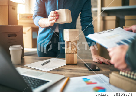 people are working  at warehouse 58108573