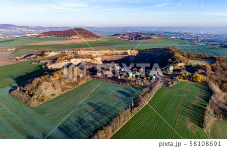 Aerial view of machinery in open gravel pit mining. Processing plant for crushed stone and gravel 58108691