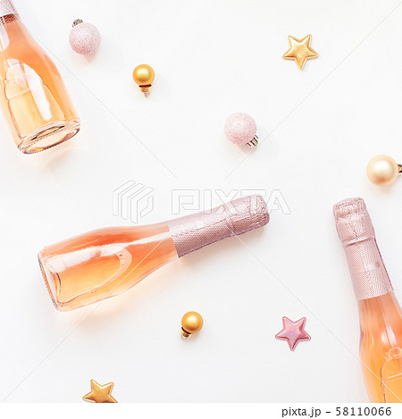 Bottles of rose champagne wine on white background Bottles of rose champagne wine on white background 58110066