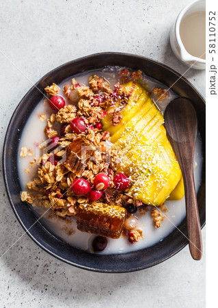 Baked oatmeal with berries and mango Baked oatmeal with berries and mango 58110752