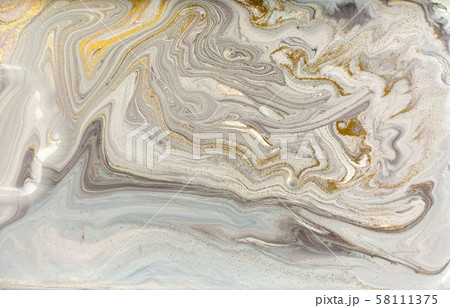 Gray marble pattern with golden glitter. Stone ripple texture. Gray marble pattern with golden glitter. Stone ripple texture. 58111375