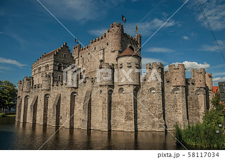 Lake and green in front of Gravensteen Castle at Ghent Lake and green in front of Gravensteen Castle at Ghent 58117034