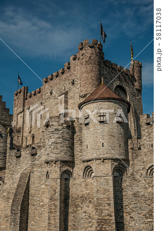 Stone wall and watchtower of the Gravensteen Castle in Ghent 58117038