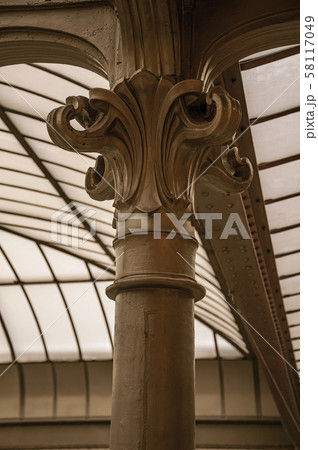 Cast-iron capital in Art Nouveau style and glass ceiling in Brussels Cast-iron capital in Art Nouveau style and glass ceiling in Brussels 58117049