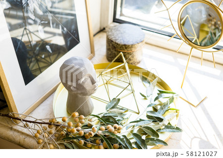 Luxurious home decoration in gold tones, real interior decor details 58121027